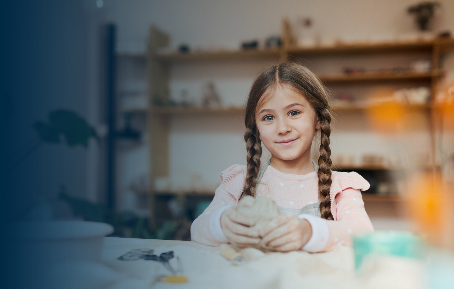 Smiling child engaged in a hands-on activity